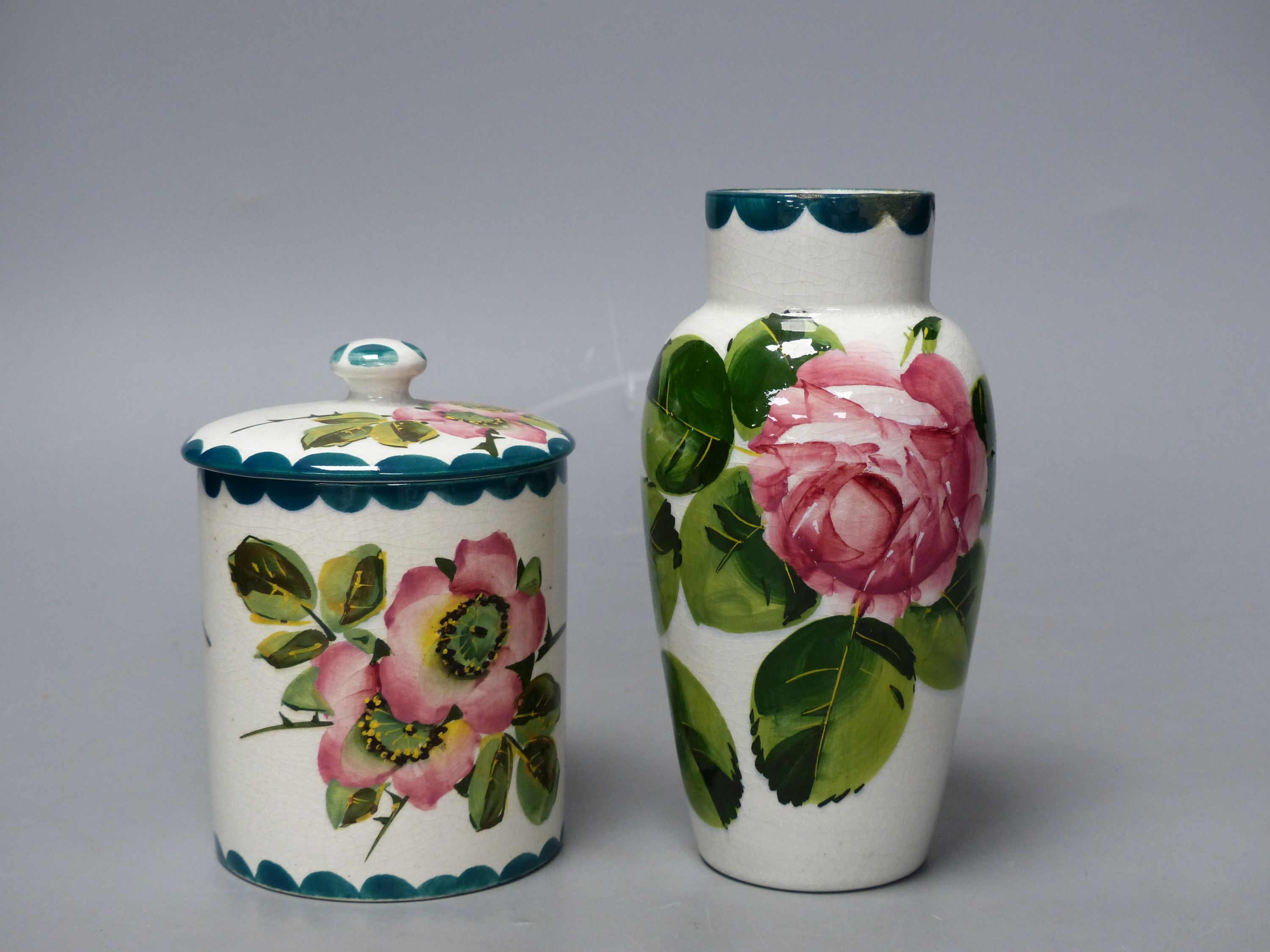 A Wemyss cabbage rose vase and a wild rose pattern lidded preserve jar, tallest 16cm